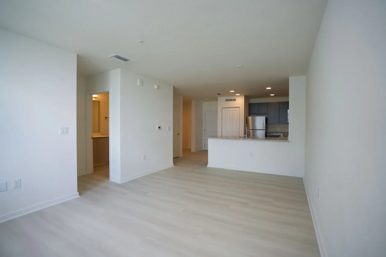 Empty open-plan apartment interior, cleaned and ready